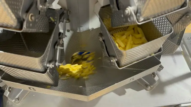 Multihead weigher dosing French fries on the refurbished STC packing line