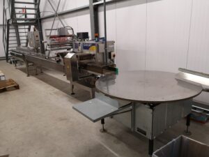 Volautomatische toevoer met accumulatietafel voor de flowpacker