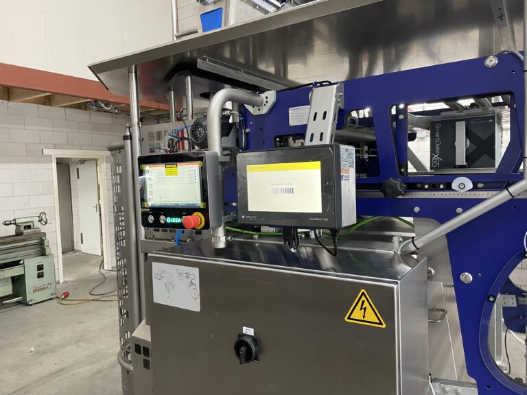 Volautomatische wortellijn met Newtec-weger en Jasa-verpakker – foto 3